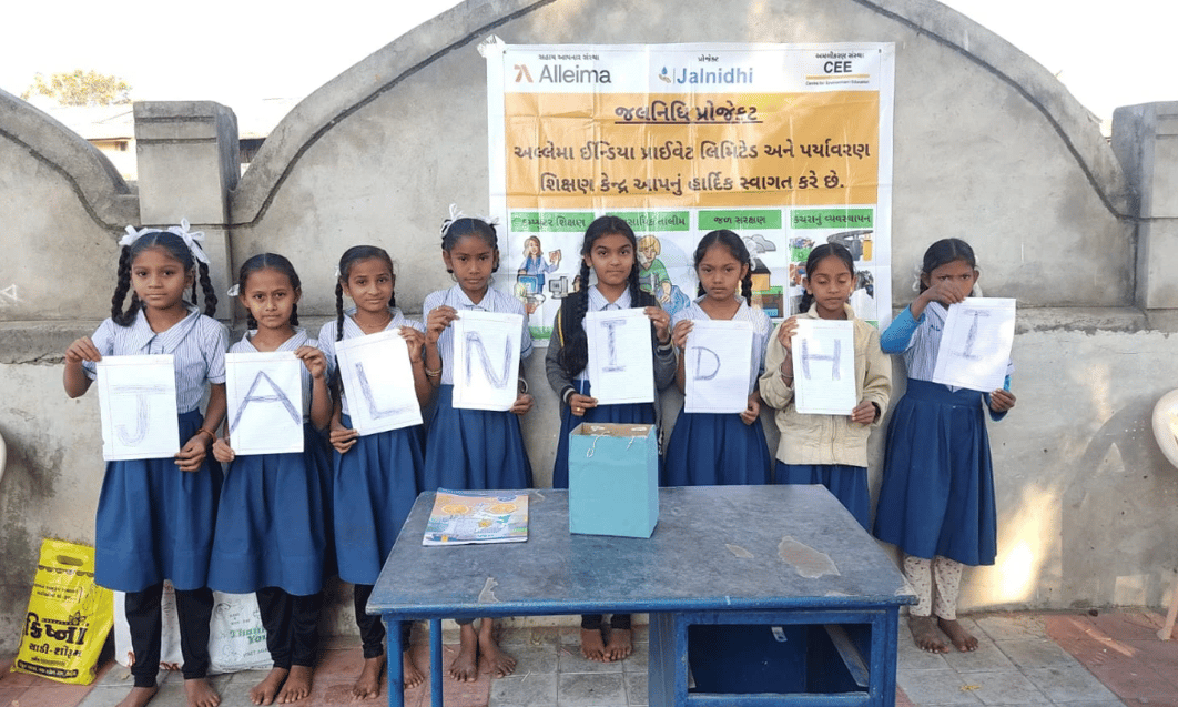 a group of childs holding signs