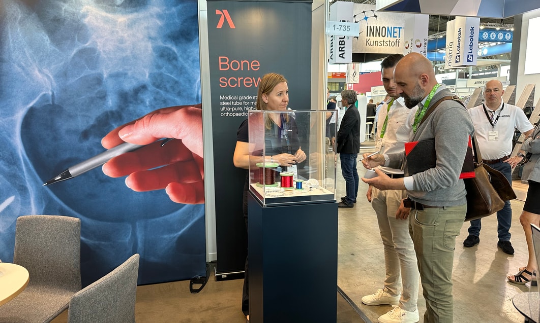 a group of people standing in a room