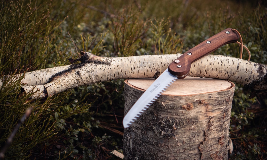 a knife on a log