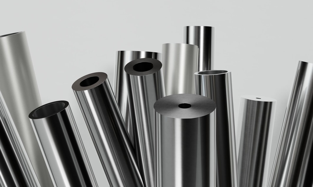 a group of shiny metal tubes
