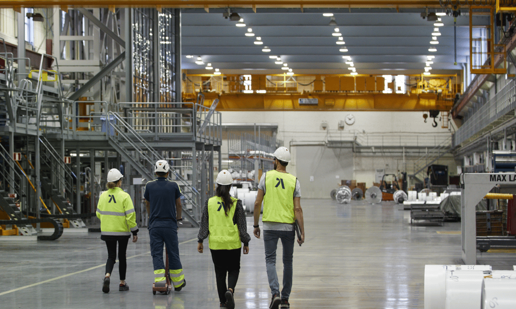 a group of people in a factory