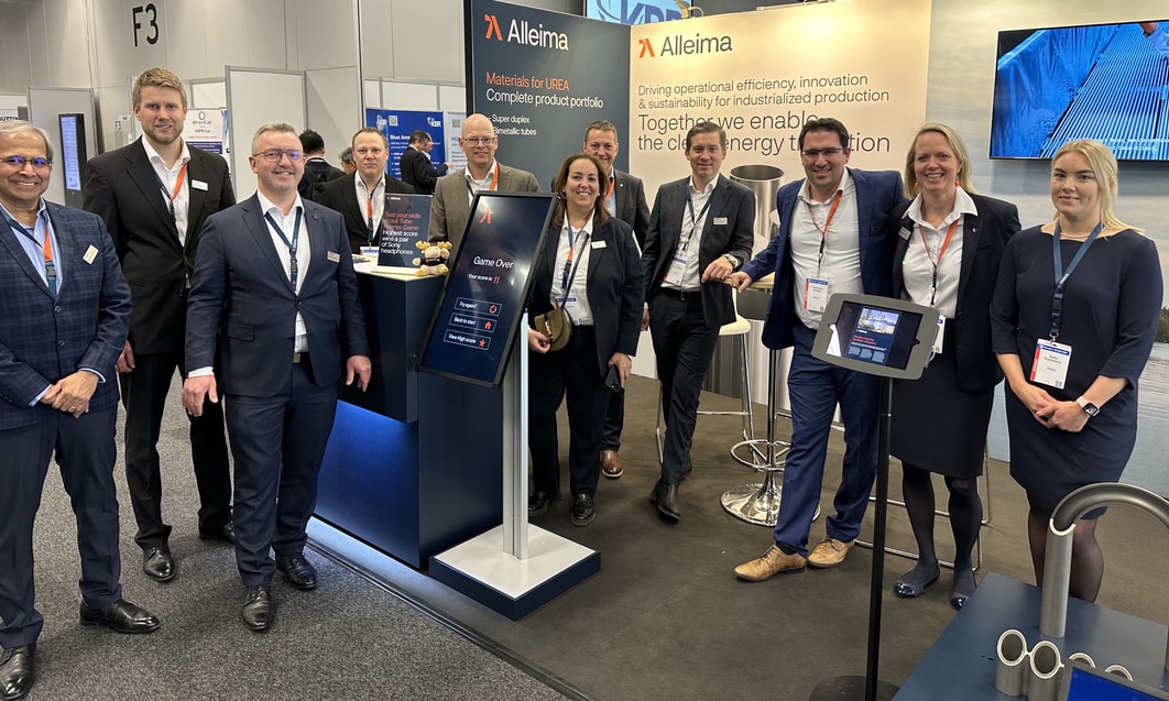 a group of people standing in front of a podium