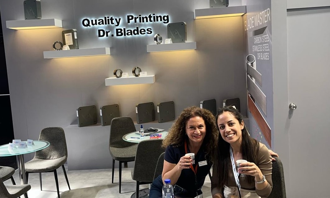 two women sitting at a table