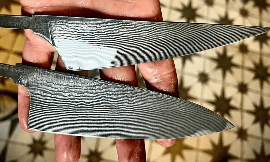 a person holding two knives