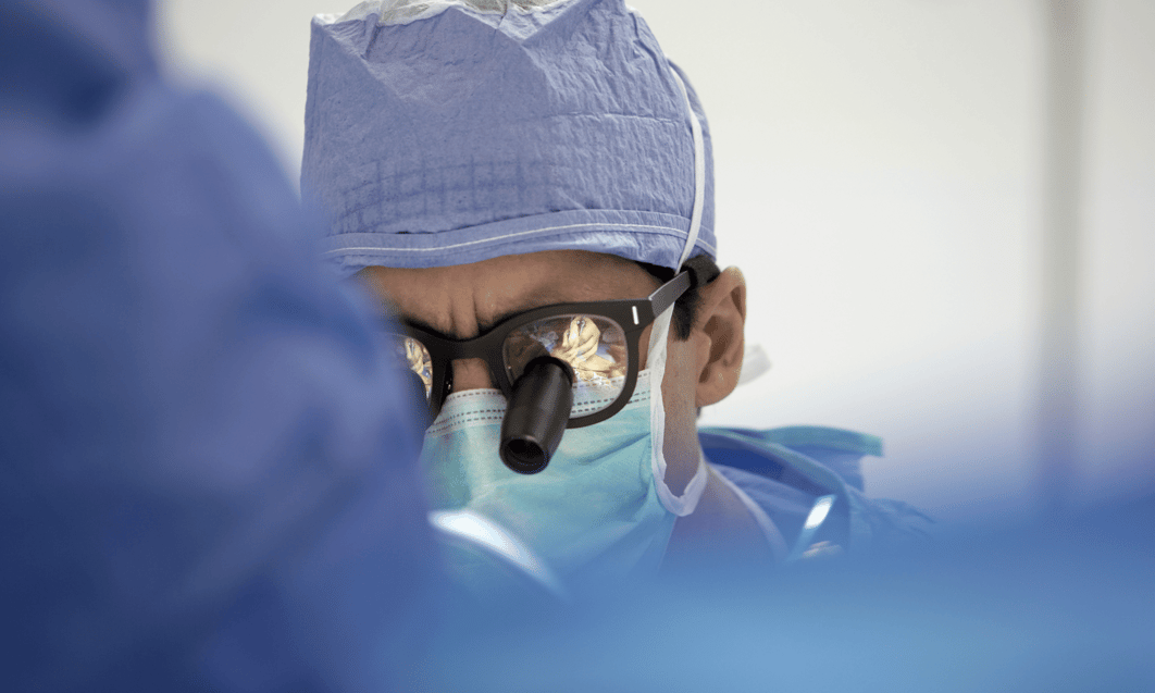 a person wearing a mask and glasses