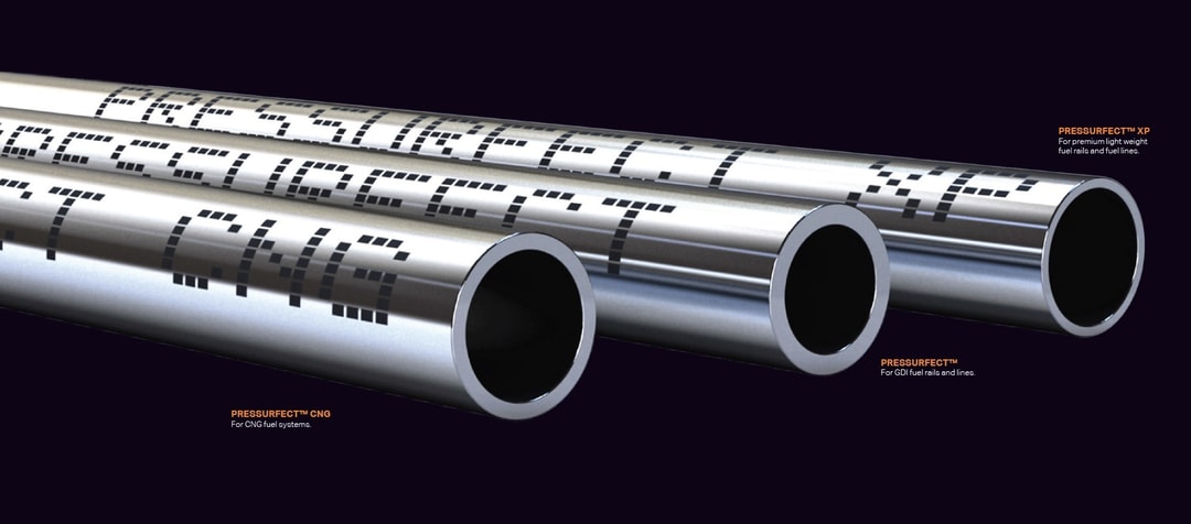 several metal pipes with numbers on them