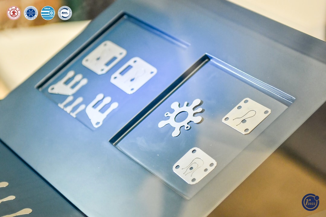 a blue rectangular object with metal shapes