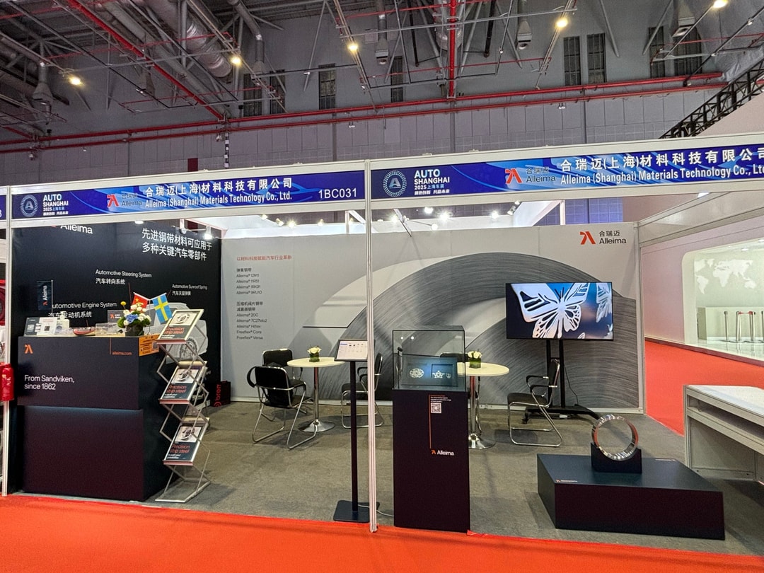 a booth with a sign and a couple of tables