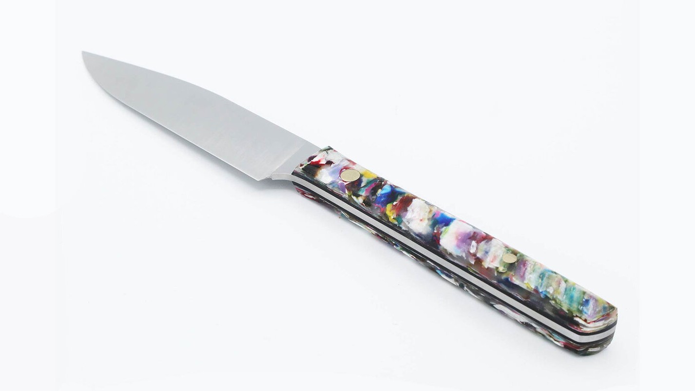 a multicolored knife with a handle