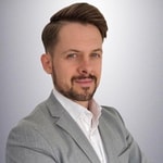 en person i en kostym