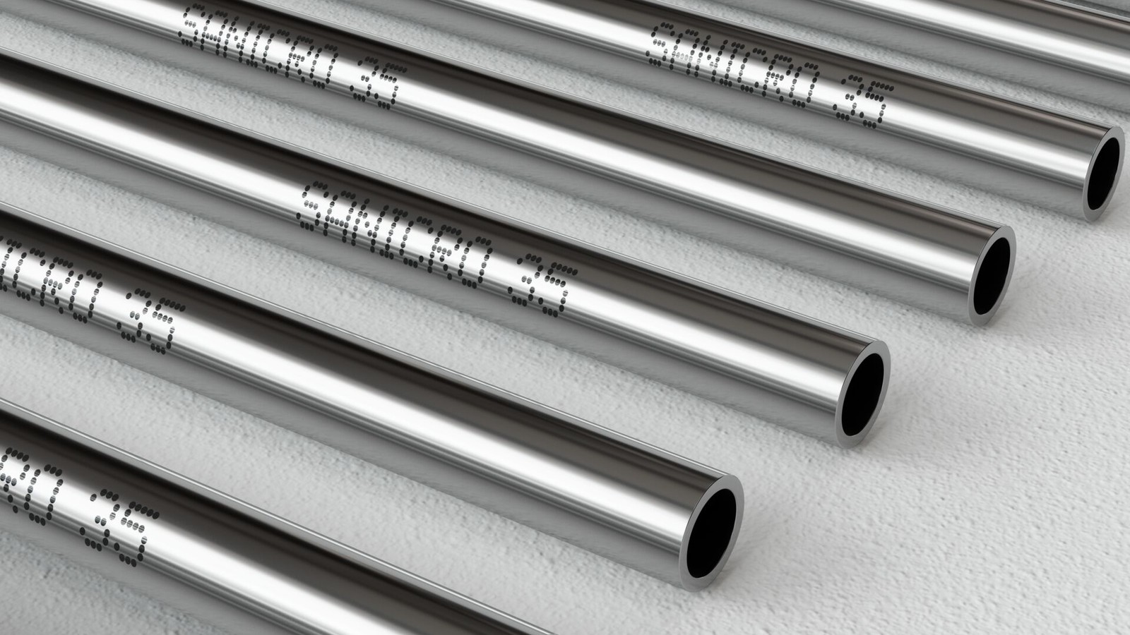 several metal pipes with writing on them