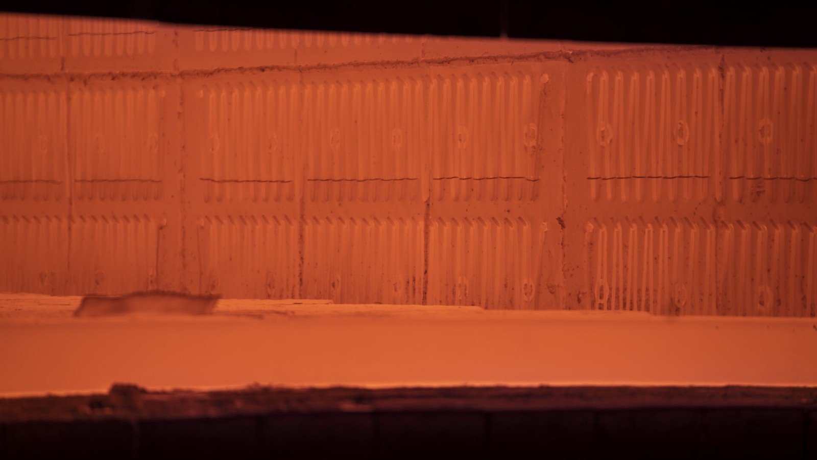 a wall with a red light