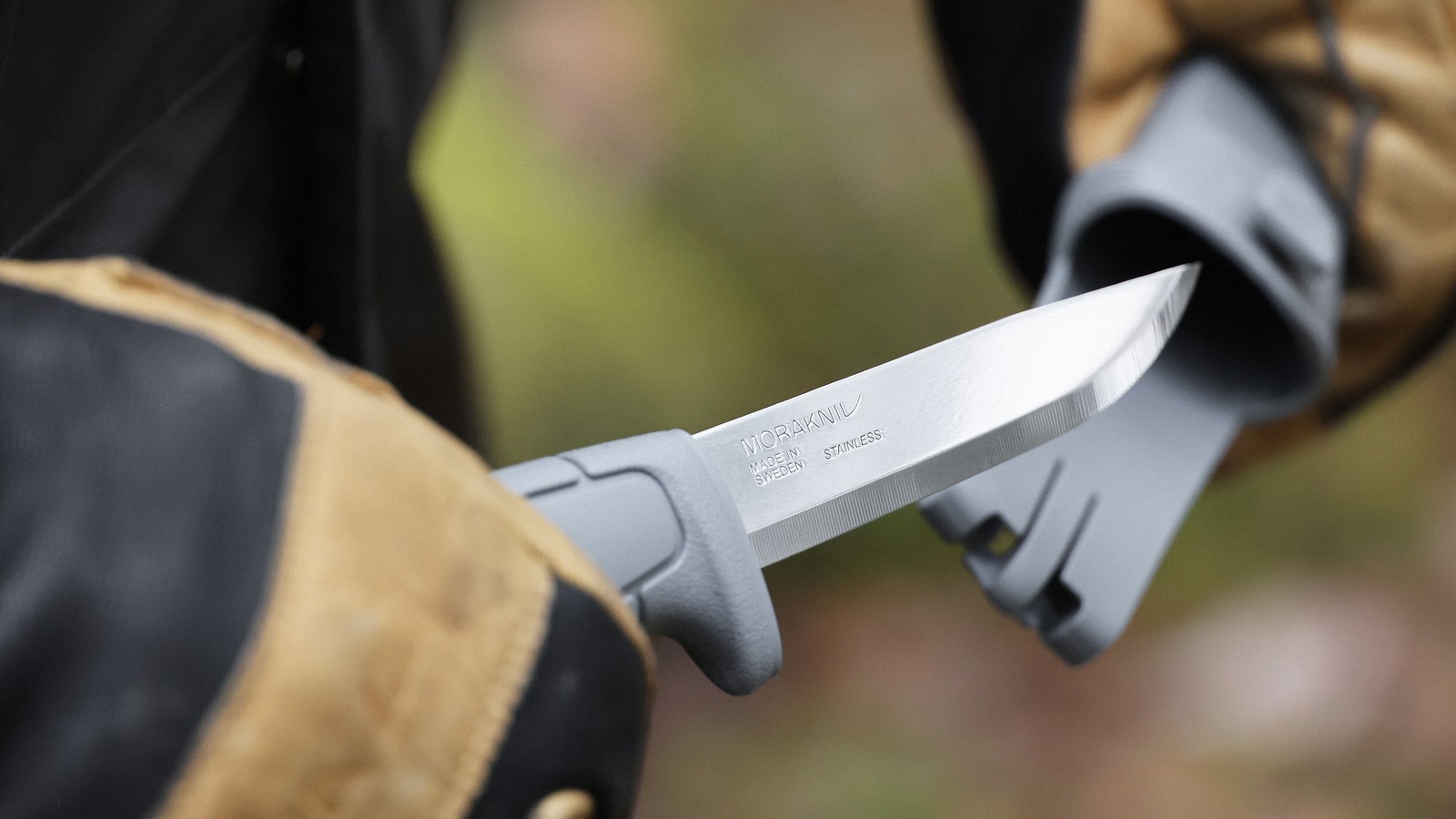 a person holding a knife