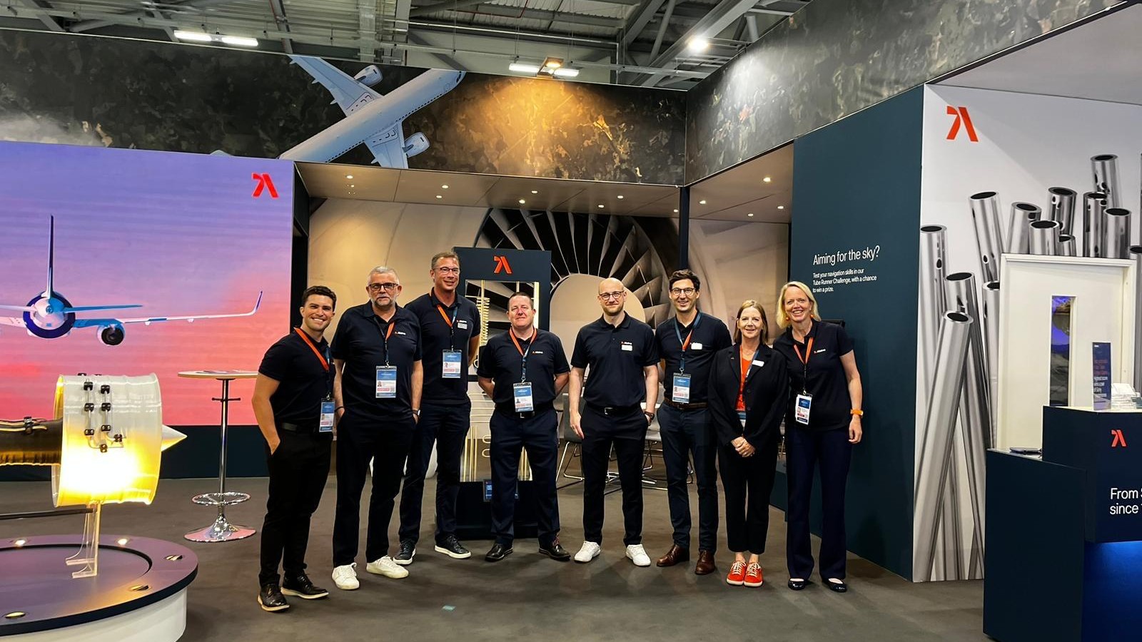 a group of people standing in a room