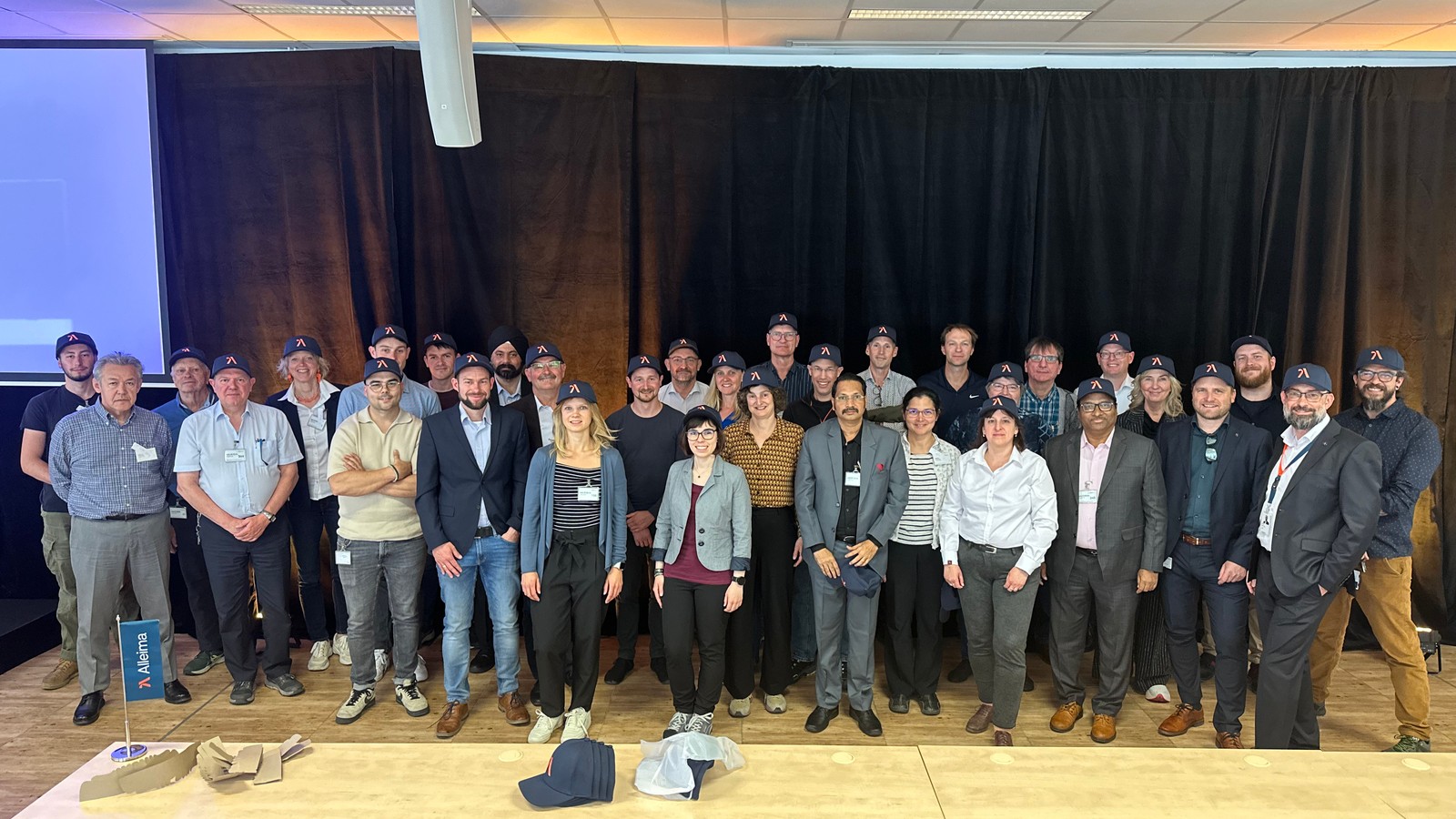 a group of people standing on a stage