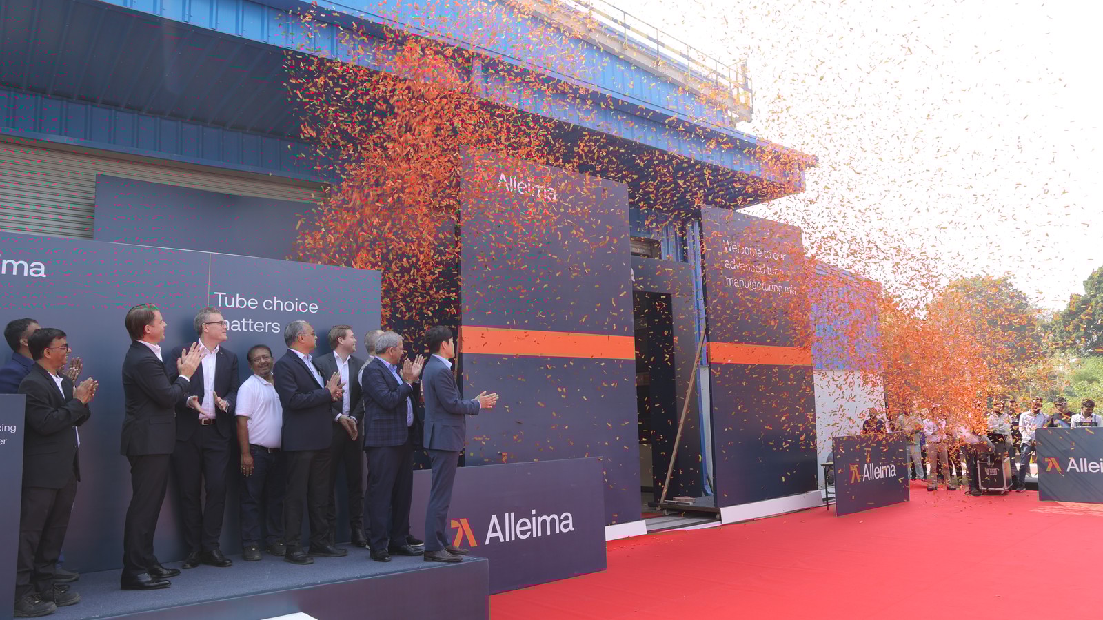a group of men standing on a stage