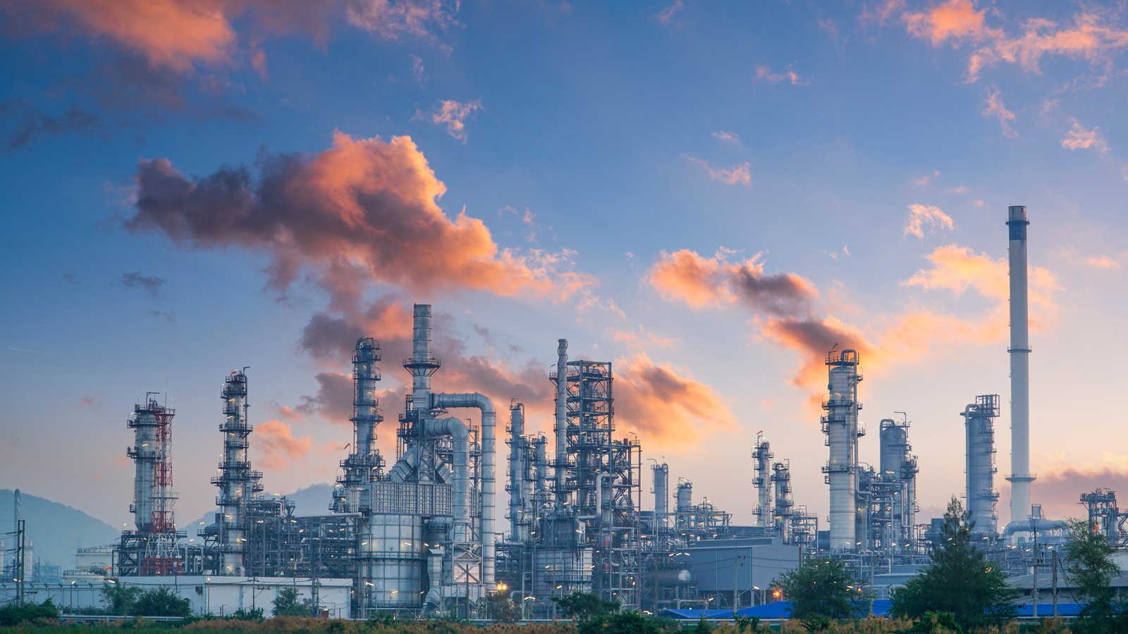 a factory with smoke coming out of it