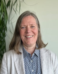 a person smiling at camera