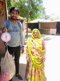 a person standing next to a person