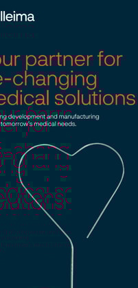 a heart shaped wire on a blue background