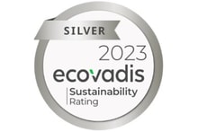 a silver label with black text and numbers