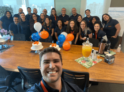 a group of people posing for a photo