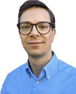 a person wearing glasses and a blue shirt