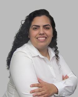 a person with long hair wearing a white shirt