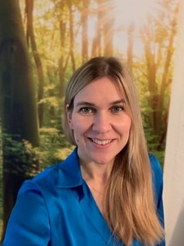 a person smiling at the camera