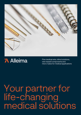 a heart shaped wire on a blue background