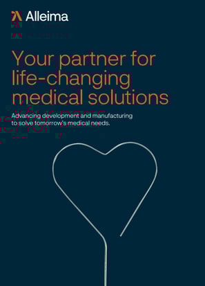 a heart shaped wire on a blue background