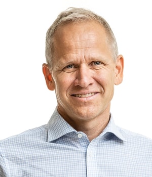 a person smiling at the camera