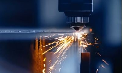 A laser cutting machine cutting out steel