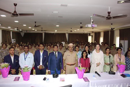 a group of people standing in a room