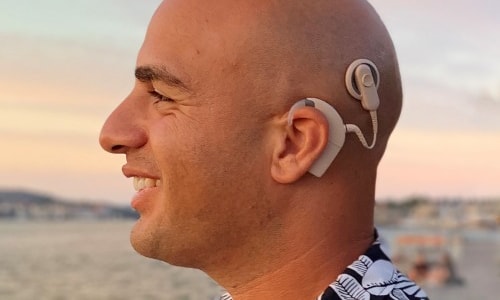 a person with a hearing aid