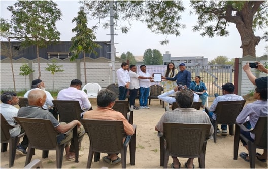 a group of people sitting in chairs