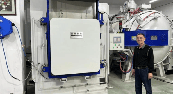 Mr. Situ of Weigao, China by his heat treatment furnace.