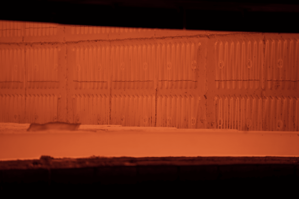 a room with a wall and a red light