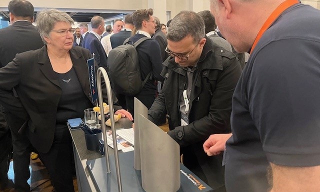 a group of people at a convention