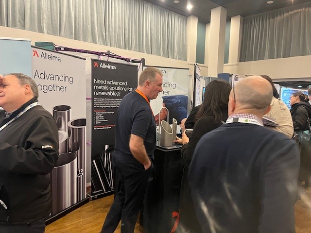 a group of people standing in a room