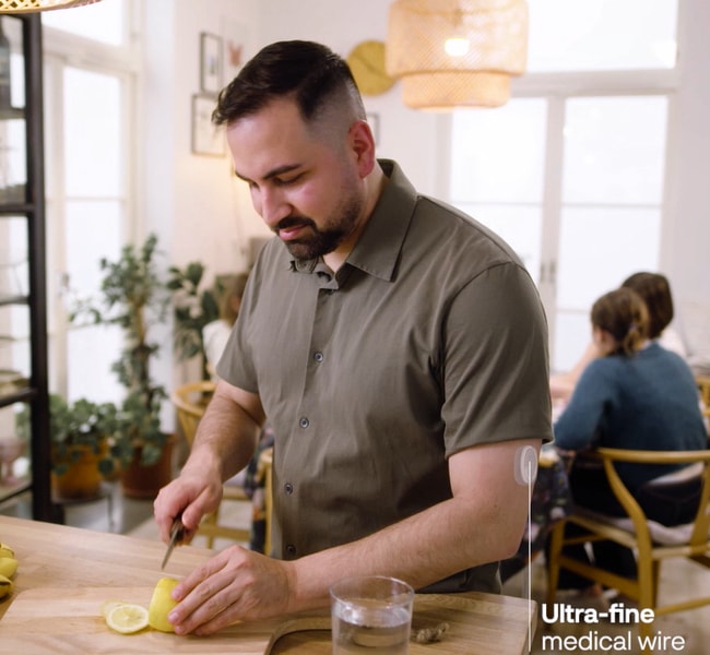 a person cutting a lemon