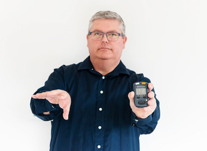 a person holding a device
