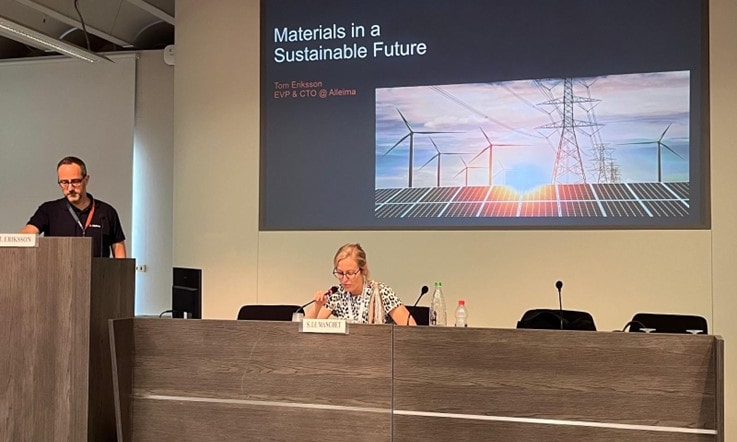 a person and person at a podium