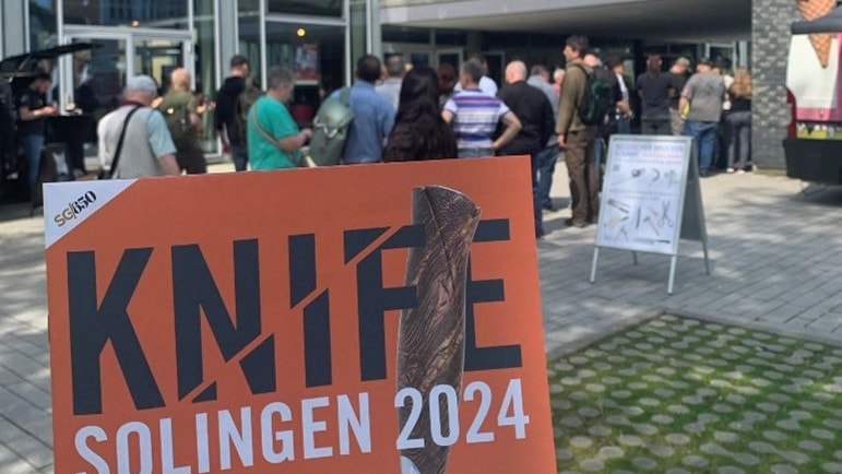 a group of people outside a building