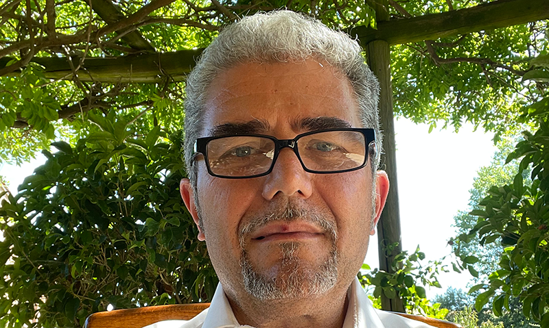 a person with glasses and a beard