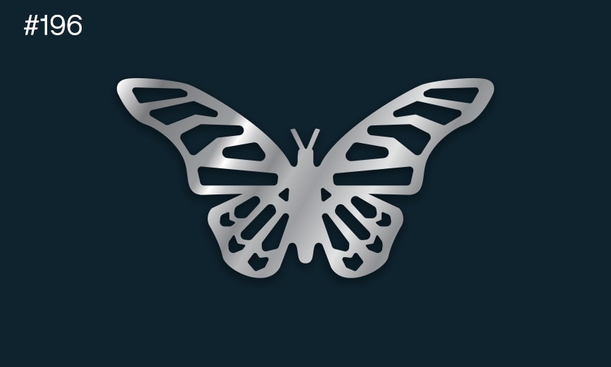 a silver butterfly on a dark background