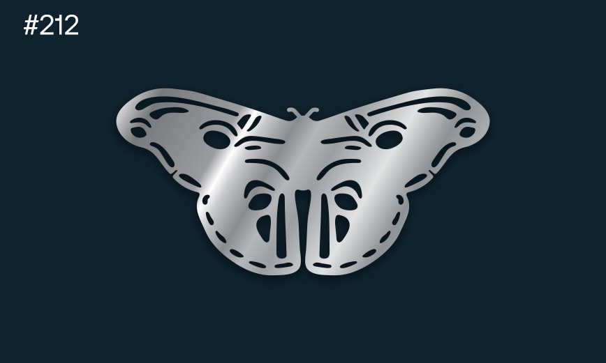 a silver butterfly with holes