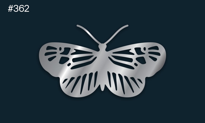 a silver butterfly on a dark background