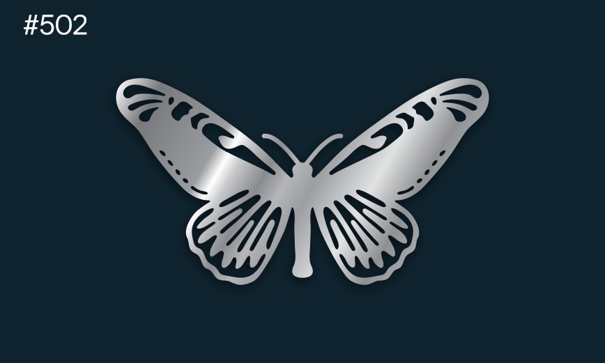 a silver butterfly on a dark background