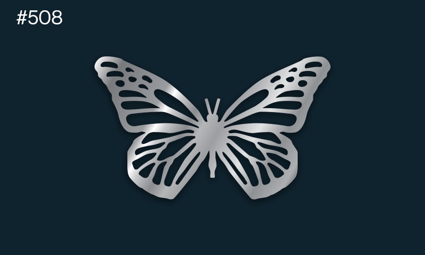 a silver butterfly on a dark background